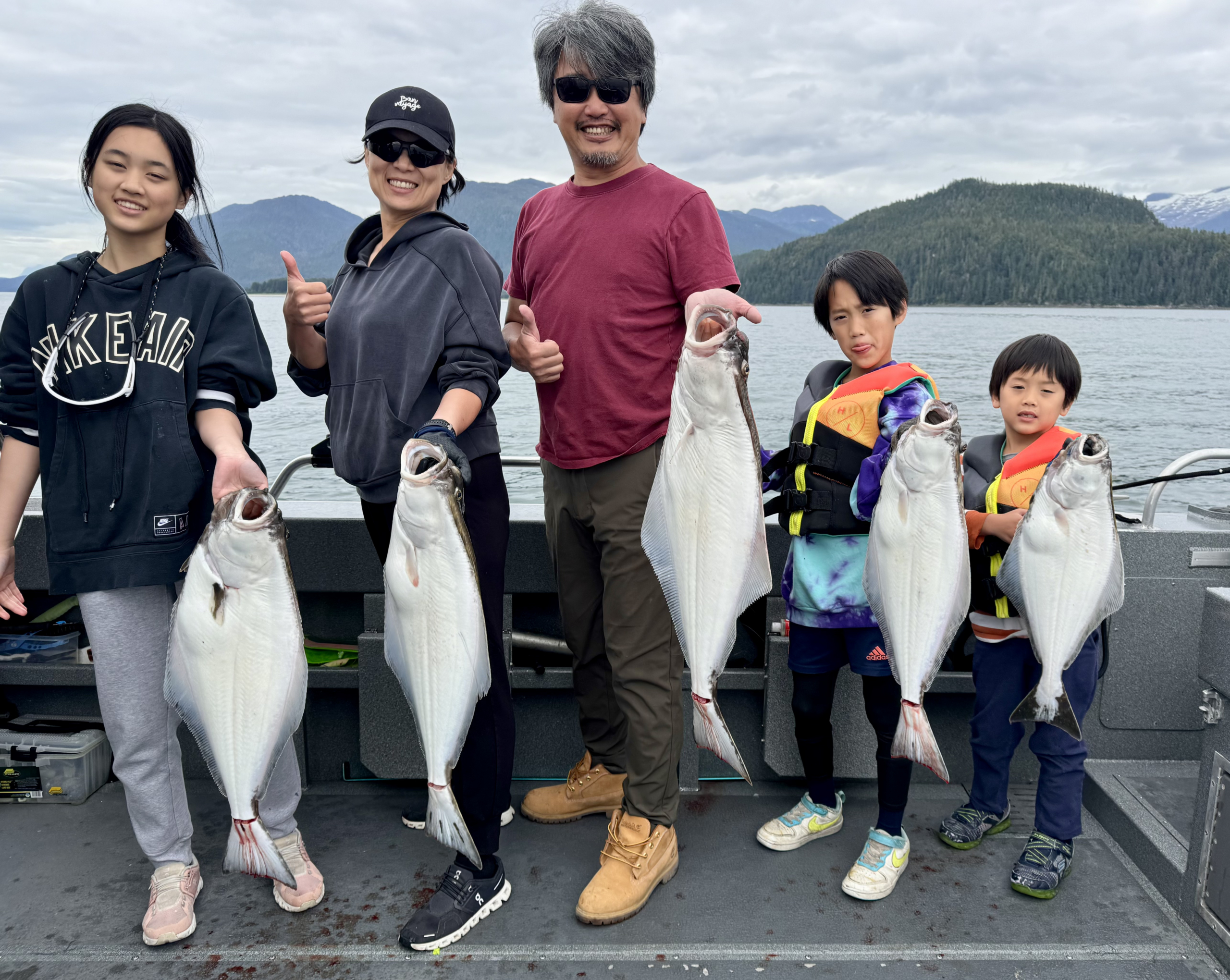 Guests fishing in Juneau Alaska on a private charter with Adventures in Alaska